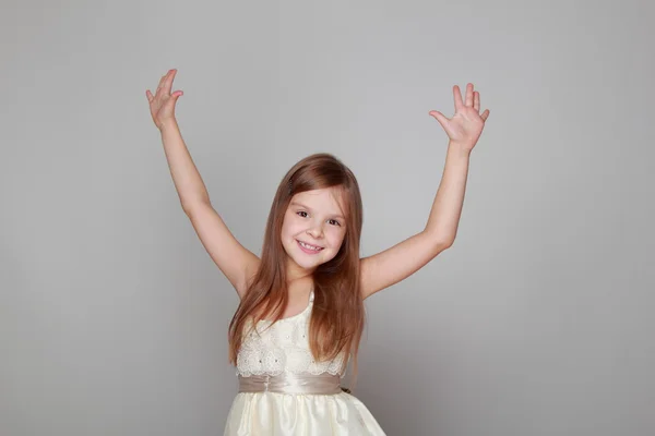 Girl is dancing on a gray background — Stock Photo, Image