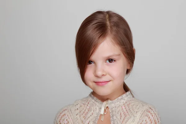 Girl on a gray background — Stock Photo, Image