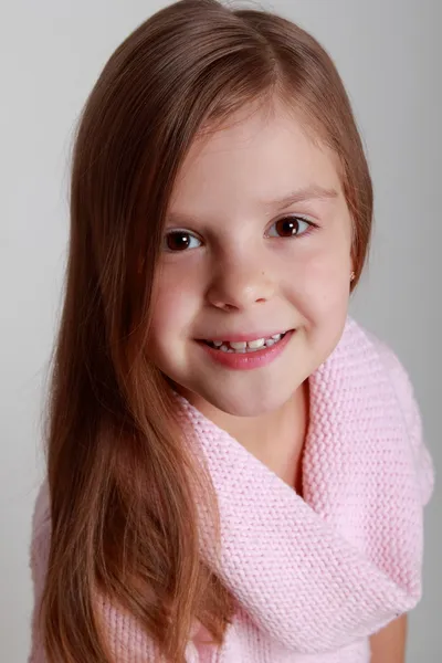 Girl on a gray background — Stock Photo, Image