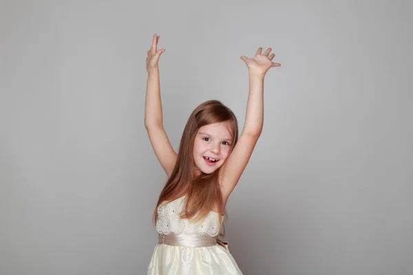 Girl dancing on a gray background — Stock Photo, Image