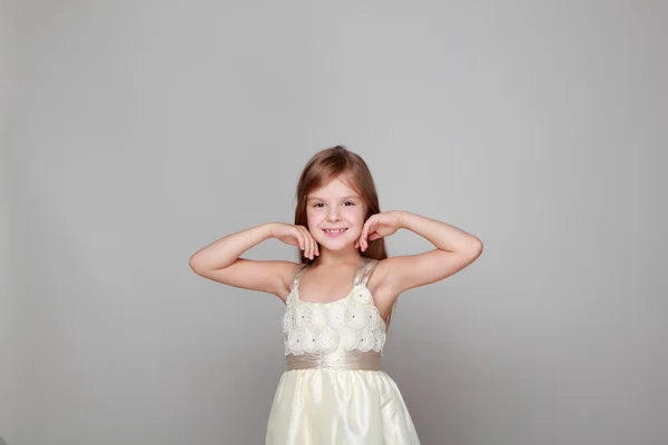 Cute little girl in dress — Stock Photo, Image