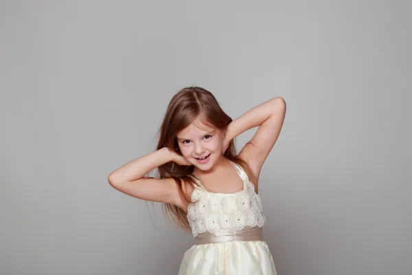 Girl on gray background — Stock Photo, Image