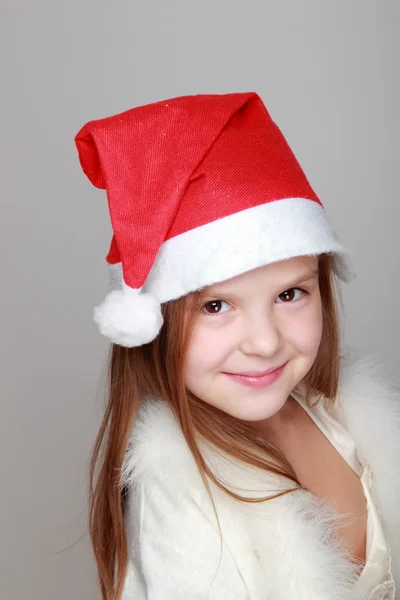 Ragazza in cappello Babbo Natale — Foto Stock