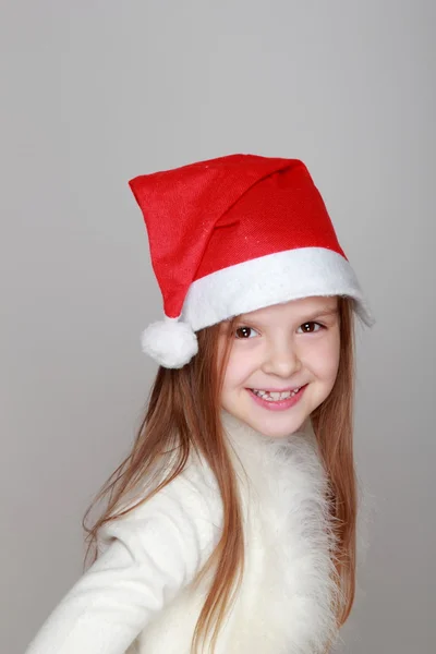 Ragazza in cappello Babbo Natale — Foto Stock