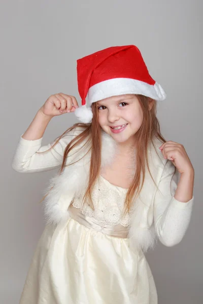 Meisje in santa hoed — Stockfoto