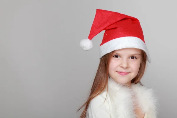 Malá holčička v santa hat — Stock fotografie