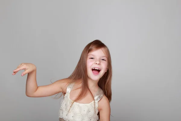 Girl on gray background — Stock Photo, Image