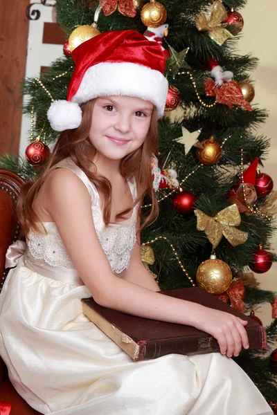 Little girl holding old fashion book — Stock Photo, Image