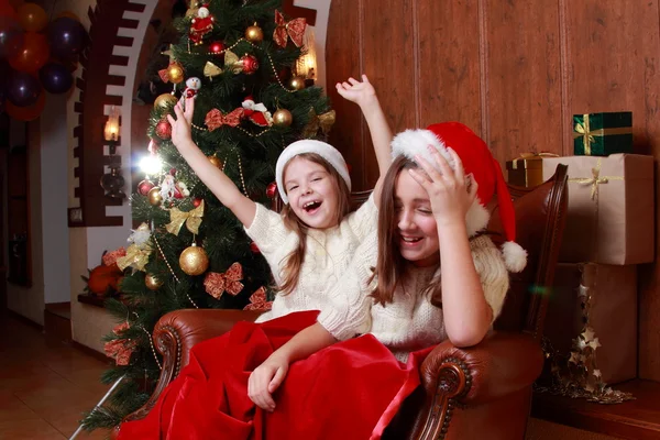 Cheerful little girls on Christmas — Stock Photo, Image