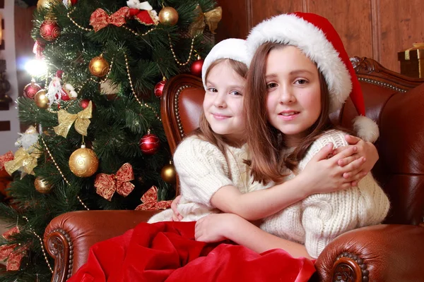 Cheerful little girls on Christmas — Stock Photo, Image