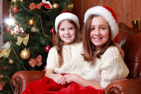 Cheerful little girls on Christmas — Stock Photo, Image