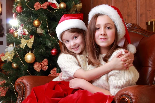 Cheerful little girls on Christmas — Stock Photo, Image