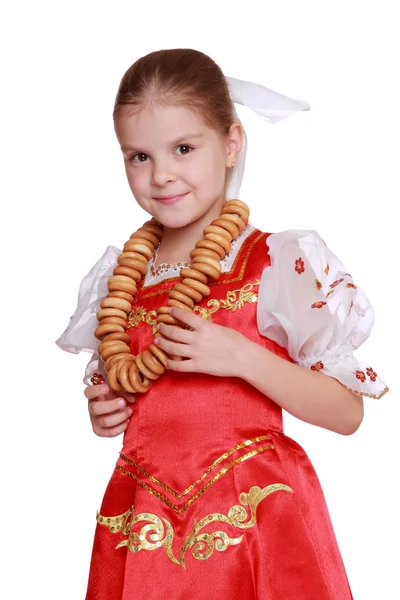 Ung flicka dansa i ryska nationella kostym — Stockfoto