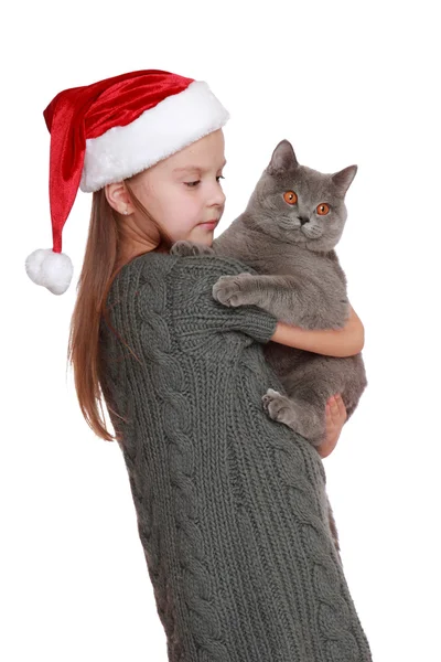 Kleines Mädchen mit ihrer neuen Katze — Stockfoto