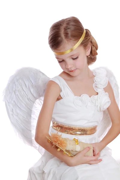 Little angel holding angel doll — Stock Photo, Image