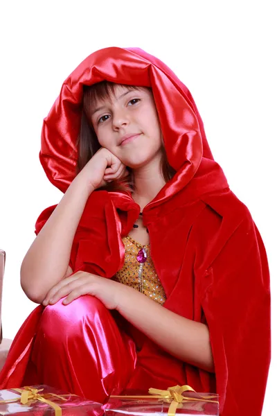 Девушка в костюме Красной Шапочки — стоковое фото