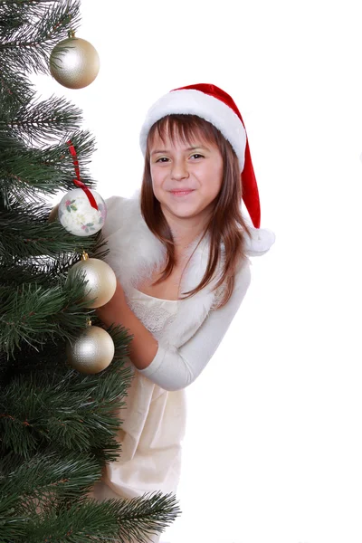 Mooi meisje in Kerstman hoed — Stockfoto