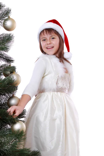 Pretty girl in santa hat Royalty Free Stock Photos