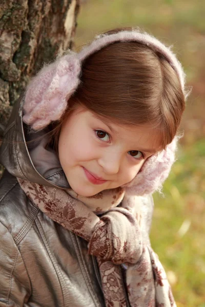 Little girl at autumn time — Stock Photo, Image