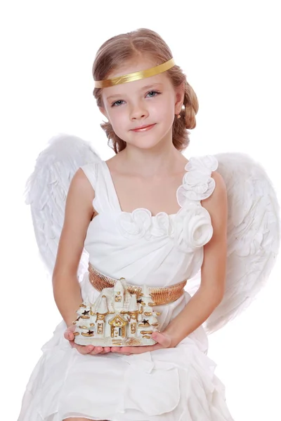 Pequeno anjo com brinquedo — Fotografia de Stock