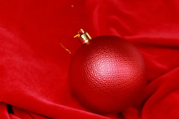 Red ball on Christmas tree — Stock Photo, Image