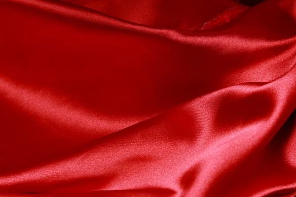 Röd satin som bakgrund — Stockfoto