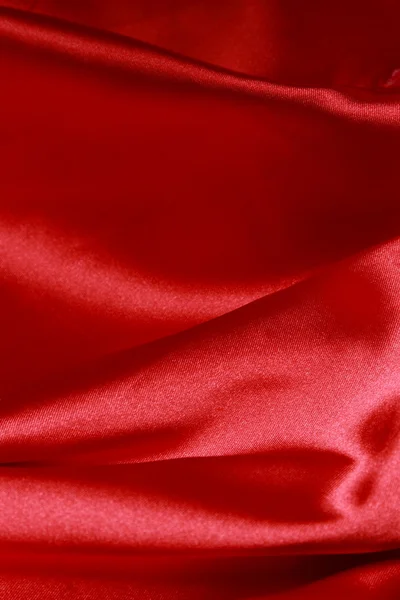 Roter Satin als Hintergrund — Stockfoto