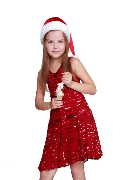 Petite fille avec poupée décotaïve à Noël — Photo