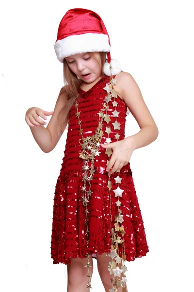 Bambina che tiene la stella d'oro di Natale — Foto Stock