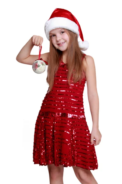 Liten flicka håller julgranskulor — Stockfoto