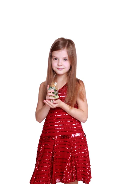 Little girl bedrijf decoratieve pop — Stockfoto
