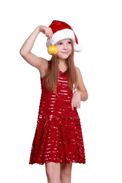 Menina segurando bola de Natal — Fotografia de Stock