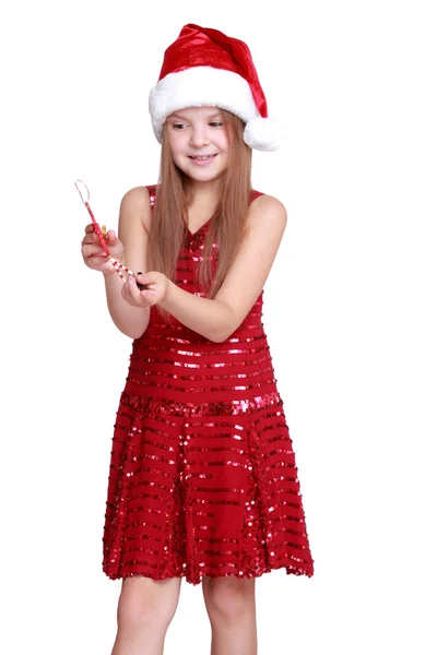 Κοριτσάκι που κρατάει ένα παιχνίδι Χριστούγεννα — Φωτογραφία Αρχείου