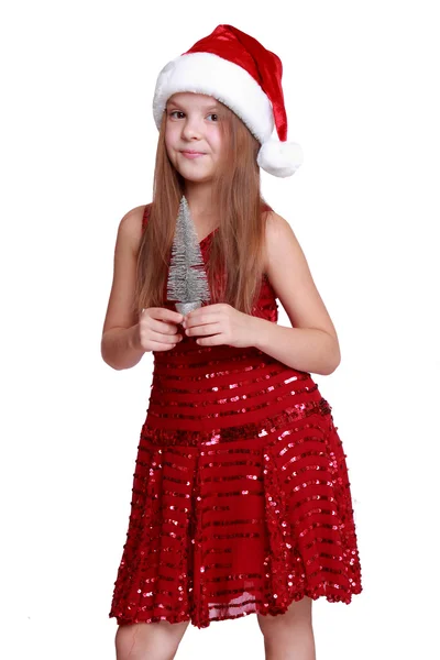 Girl with small christmas tree — Stock Photo, Image