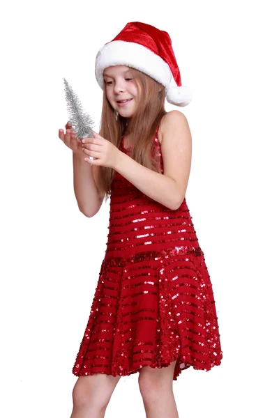 小さなクリスマス ツリーを持つ少女 — ストック写真