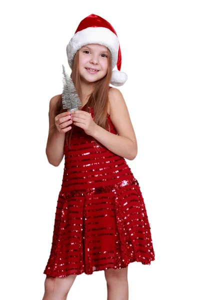 Meisje met kleine kerstboom — Stockfoto