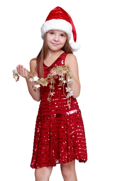 Little girl holding christmas golden stars — Stock Photo, Image