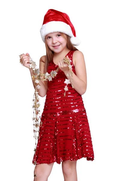 Little girl holding christmas golden stars — Stock Photo, Image