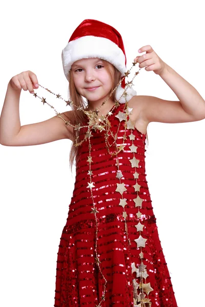 Little girl holding christmas golden stars — Stock Photo, Image