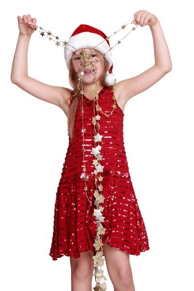 Little girl holding christmas golden stars — Stock Photo, Image