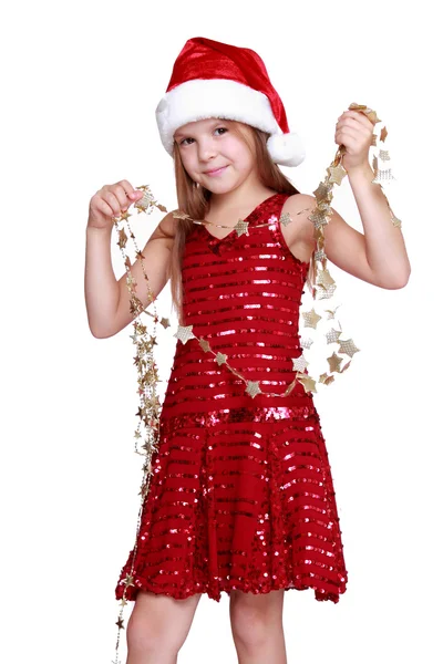 Little girl holding christmas golden stars Royalty Free Stock Photos