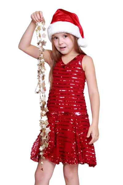 Little girl holding christmas golden stars Royalty Free Stock Images