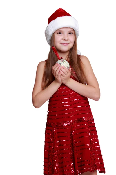 Menina segurando bola de Natal — Fotografia de Stock