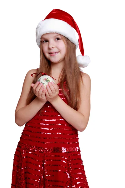 Petite fille tenant boule de Noël — Photo