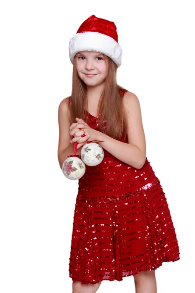 Petite fille portant un chapeau de Père Noël — Photo