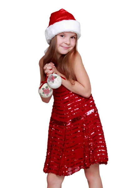 Niña vistiendo un sombrero de Santa — Foto de Stock