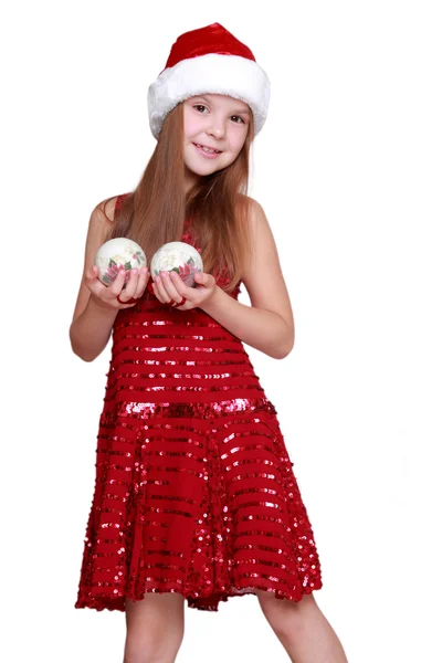 小女孩在圣诞老人的帽子上的节日主题 — 图库照片