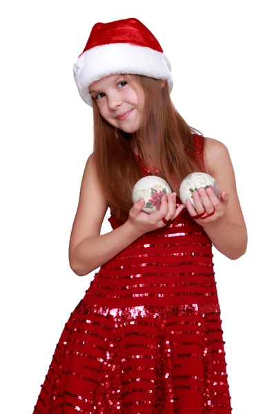 Little girl in Santa hat on Holiday theme — Stock Photo, Image