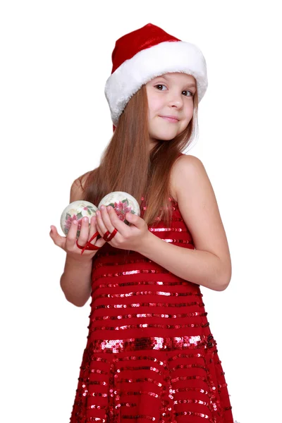 Menina em chapéu de Santa no tema de férias — Fotografia de Stock