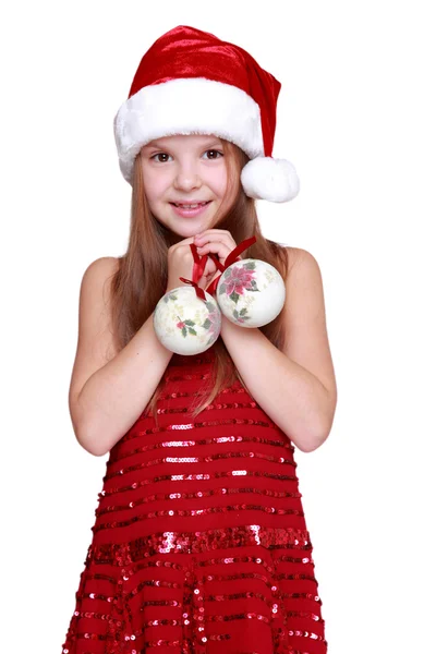 Preschool meisje bedrijf Kerstdecoratie in handen — Stockfoto